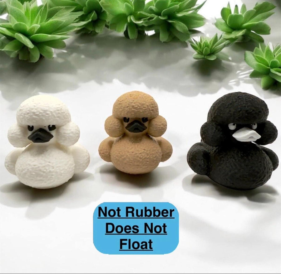 Poodle dog duck figurine