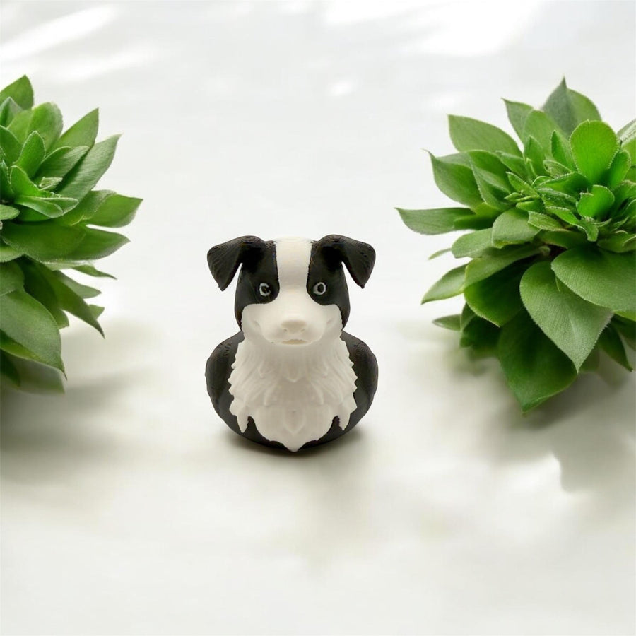Border Collie dog duck figurine