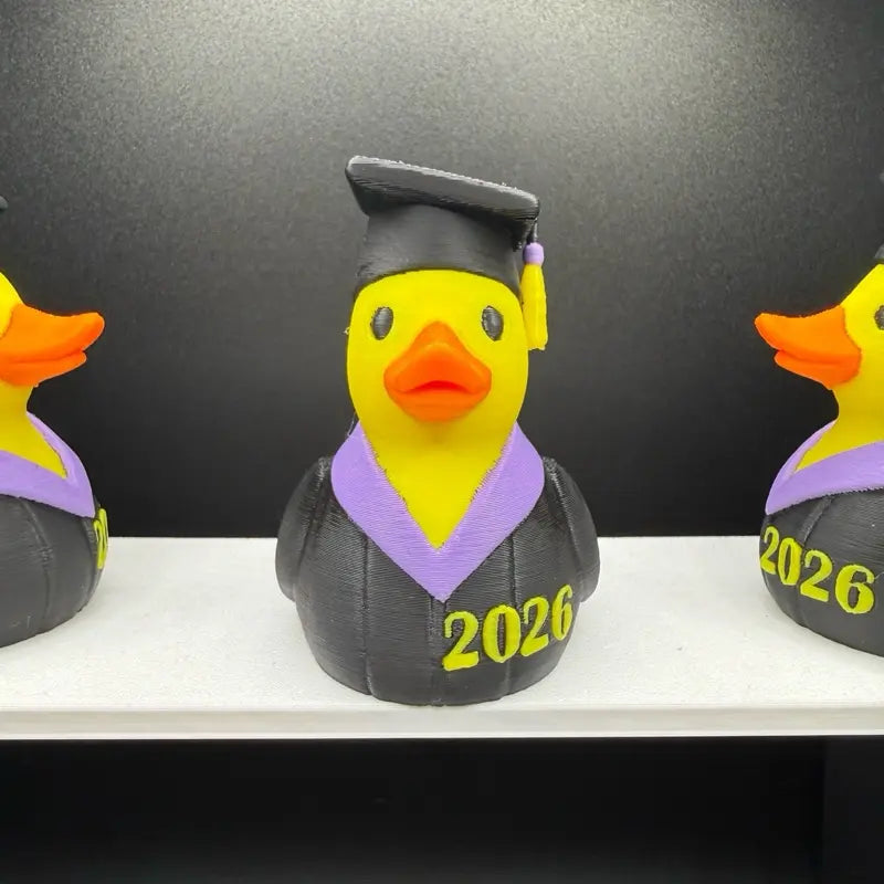 Class of 2026 graduation duck with cap and gown