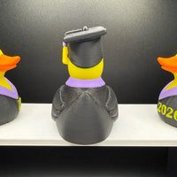 Graduation duck figurine on a desk