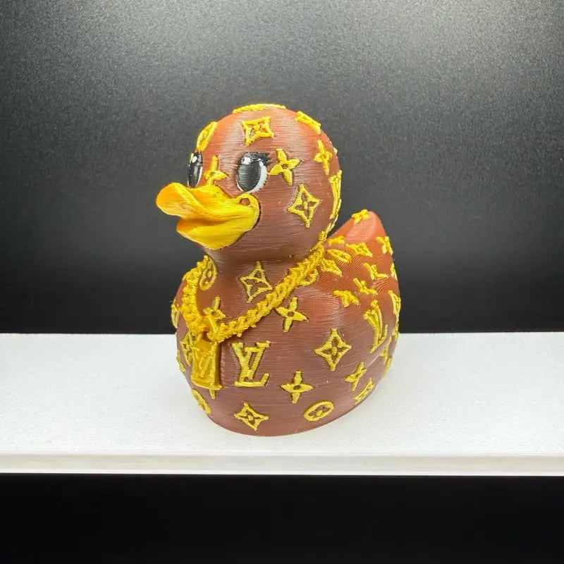 Louis Vuitton-inspired handbag duck with gold monogram pattern