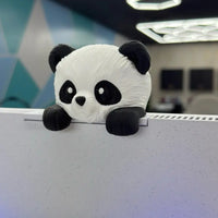 Panda screen sitter hanging over a monitor bezel